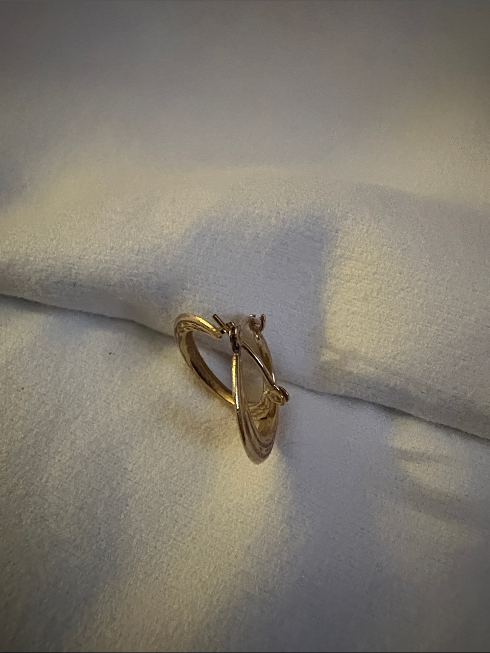 Vintage 14K gold hoop earrings with textured ridged